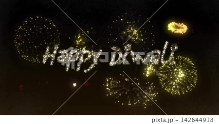 Forming Happy Diwali phrase in night sky, featuring radial bursts, sparklers, smoke plumes 142644918