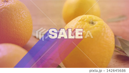 Displaying large ripe orange showing textured peel on wooden countertop, with SALE graphic stripes Displaying large ripe orange showing textured peel on wooden countertop, with SALE graphic stripes 142645686