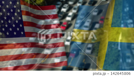 Displaying United States flag and Swedish flag over blurred aerial highway, revealing busy traffic Displaying United States flag and Swedish flag over blurred aerial highway, revealing busy traffic 142645806