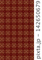 A red design with a rich golden Chinese geometric pattern 142650679
