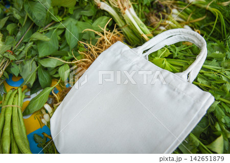Eco cotton fabric bag on fresh vegetables in the market free plastic shopping / Zero waste use less plastic 142651879