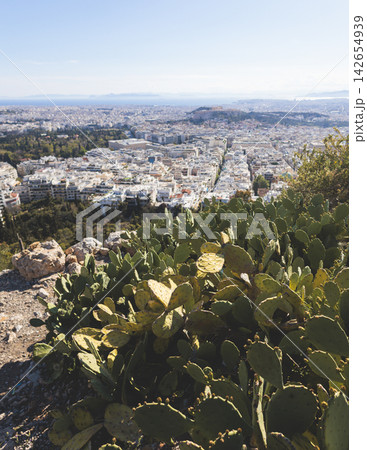 Mount Lycabettus, Athens, Greece, hiking and climbing to Lycabettos hill and Holy Church of Saint George of Lycabettus, Attica, Athens cityscape panorama view in sunny day, Lykavittos Greek landscape Mount Lycabettus, Athens, Greece, hiking and climbing to Lycabettos hill and Holy Church of Saint George of Lycabettus, Attica, Athens cityscape panorama view in sunny day, Lykavittos Greek landscape 142654939