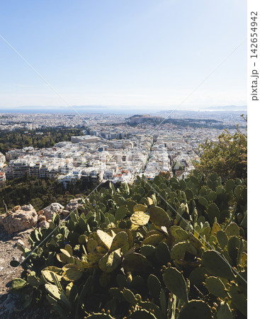 Mount Lycabettus, Athens, Greece, hiking and climbing to Lycabettos hill and Holy Church of Saint George of Lycabettus, Attica, Athens cityscape panorama view in sunny day, Lykavittos Greek landscape 142654942