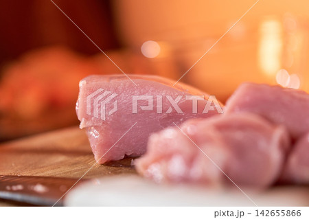Close-up of raw red meat piece with focus on muscle fiber texture 142655866