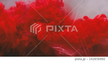Steam paint splash. Mix color cloud. Defocused red white fog particles smoke glitter water spreading on acrylic abstract background. Steam paint splash. Mix color cloud. Defocused red white fog particles smoke glitter water spreading on acrylic abstract background. 142656992