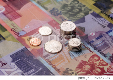 Ghana, Ghanaian paper money, cedi banknotes as currency for exchange or travel. Ghana money Ghana, Ghanaian paper money, cedi banknotes as currency for exchange or travel. Ghana money 142657985