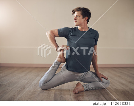 Flexibility, yoga or man in house for exercise, wellness or body posture in mermaids pose, routine or studio. Relax, zen yogi or guy on floor for mindfulness, wellbeing or balance in pilates session Flexibility, yoga or man in house for exercise, wellness or body posture in mermaids pose, routine or studio. Relax, zen yogi or guy on floor for mindfulness, wellbeing or balance in pilates session 142658322