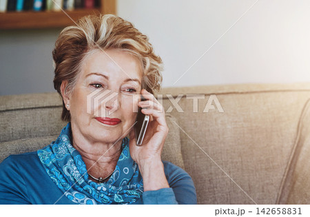 Face, phone call and thinking with senior woman on sofa in living room of retirement home for communication. Contact, conversation and mobile with elderly person in apartment for chatting or talking Face, phone call and thinking with senior woman on sofa in living room of retirement home for communication. Contact, conversation and mobile with elderly person in apartment for chatting or talking 142658831