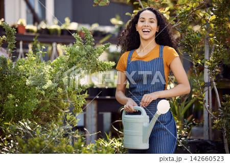 Gardening, portrait and water with woman in nursery for growth, small business or sustainability. Flowers, garden or plants and happy person with watering can at startup for eco friendly retail 142660523