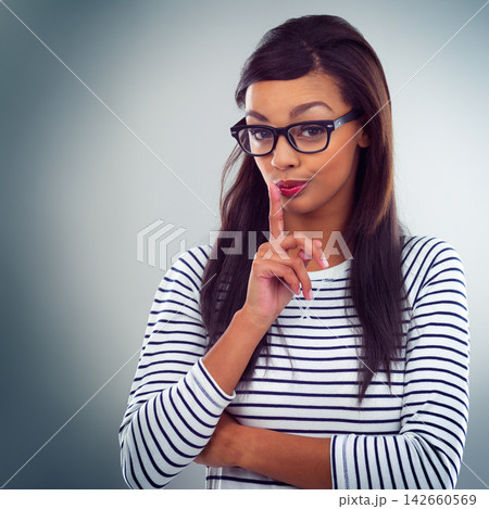 Portrait, woman and finger for warning, feedback and model on white studio background. Face, person and girl with glasses, hand gesture or rejection with stop, serious and refuse with caution or sign Portrait, woman and finger for warning, feedback and model on white studio background. Face, person and girl with glasses, hand gesture or rejection with stop, serious and refuse with caution or sign 142660569