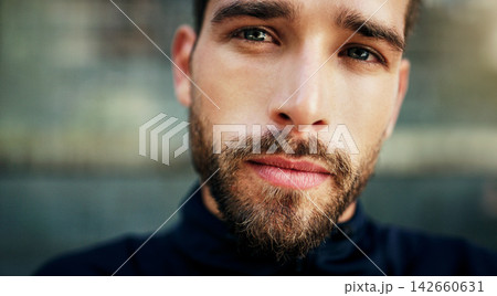 Man, beard and portrait with sunlight for good feeling, masculine and handsome outdoors. Male person, confident and blue eyes in city for calm, relax and break from working in sunshine outside 142660631
