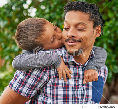 Father, kiss and child in backyard for love, care and happiness for piggy back. Black man, boy and embrace in garden for bonding, family and together in park for holiday or vacation in spring time Father, kiss and child in backyard for love, care and happiness for piggy back. Black man, boy and embrace in garden for bonding, family and together in park for holiday or vacation in spring time 142660869