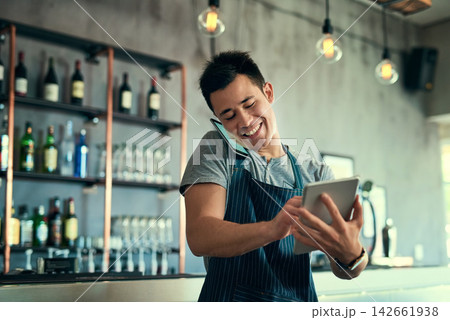 Man, phone call and waiter in restaurant talking, tablet and typing for online review and inventory order for business. Communication, planning and information search, sales and contact suppliers 142661938