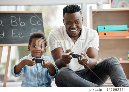 Teacher, boy and happy with video games on portrait for education, learning and child development. Black people, kindergarten and smile with gaming experience for cartoon or alphabetic assessment Teacher, boy and happy with video games on portrait for education, learning and child development. Black people, kindergarten and smile with gaming experience for cartoon or alphabetic assessment 142662554