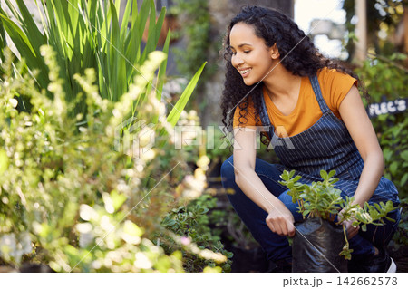 Outdoor, florist and check for plants, woman and entrepreneur with apron, spring and growth of leaves. Small business, happy and person in garden, ecology and service for shop, green and smile 142662578