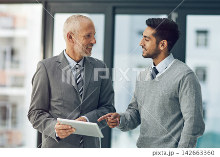 Mature man, mentor and worker on tablet with pointing in office for project, advice or business. Senior, employee and intern on technology in meeting for brainstorming, ideas and vision in corporate Mature man, mentor and worker on tablet with pointing in office for project, advice or business. Senior, employee and intern on technology in meeting for brainstorming, ideas and vision in corporate 142663360