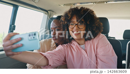 Selfie, social media and friends in car for road trip, travel or journey together on summer vacation. Smile, profile picture and pout with young women on mobile app in vehicle for holiday transport Selfie, social media and friends in car for road trip, travel or journey together on summer vacation. Smile, profile picture and pout with young women on mobile app in vehicle for holiday transport 142663609