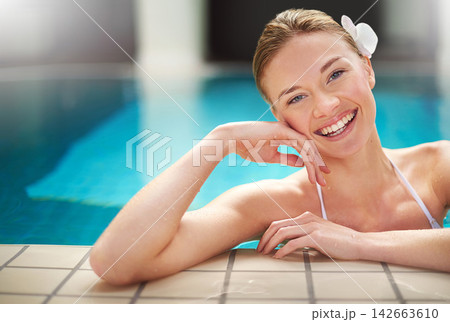 Happy, portrait or woman in spa swimming pool for vacation, holiday or wellness and rest. Female person, relax and smiling at resort with water for summer getaway, weekend break or fun and self care Happy, portrait or woman in spa swimming pool for vacation, holiday or wellness and rest. Female person, relax and smiling at resort with water for summer getaway, weekend break or fun and self care 142663610