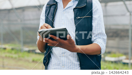 Research, tablet or hands of man in farm for agriculture or sustainability, production or website info. Closeup, greenhouse or farmer in countryside typing online for agro development or food crops Research, tablet or hands of man in farm for agriculture or sustainability, production or website info. Closeup, greenhouse or farmer in countryside typing online for agro development or food crops 142664243
