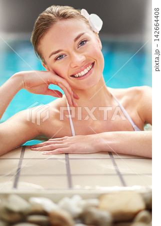 Happy, portrait or woman in spa swimming pool for vacation, holiday or wellness and rest. Female person, relax and smiling at resort with water for summer getaway, weekend break or fun and self care Happy, portrait or woman in spa swimming pool for vacation, holiday or wellness and rest. Female person, relax and smiling at resort with water for summer getaway, weekend break or fun and self care 142664408