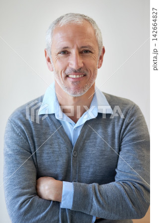 Entrepreneur, portrait and confident with arms crossed for working in office. Mature executive, happy and confidence for management, senior businessman and hands folded for professional company 142664827