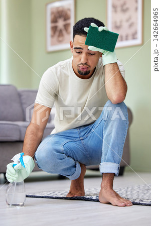 Cleaning, floor and exhausted man in home with spray for chores, housework or responsibility. Bacteria, disinfectant and germs with tired person breathing in apartment for control or hygiene Cleaning, floor and exhausted man in home with spray for chores, housework or responsibility. Bacteria, disinfectant and germs with tired person breathing in apartment for control or hygiene 142664965