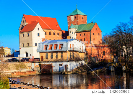 Castle of the Pomeranian Dukes or Darlowo castle on a bank of the Wieprza river in Darlowo, Poland Castle of the Pomeranian Dukes or Darlowo castle on a bank of the Wieprza river in Darlowo, Poland 142665962