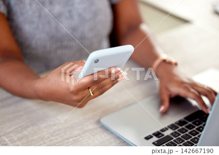 Hands, business and woman with laptop, cellphone and typing with connection, internet and hotspot for internet. Person, closeup or consultant at desk, computer and smartphone with social media or app Hands, business and woman with laptop, cellphone and typing with connection, internet and hotspot for internet. Person, closeup or consultant at desk, computer and smartphone with social media or app 142667190