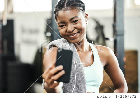 Gym, fitness or happy black woman in selfie on workout, exercise or training break for social media. Relax, sports or healthy African girl in photo for online profile picture with smile or wellness Gym, fitness or happy black woman in selfie on workout, exercise or training break for social media. Relax, sports or healthy African girl in photo for online profile picture with smile or wellness 142667572