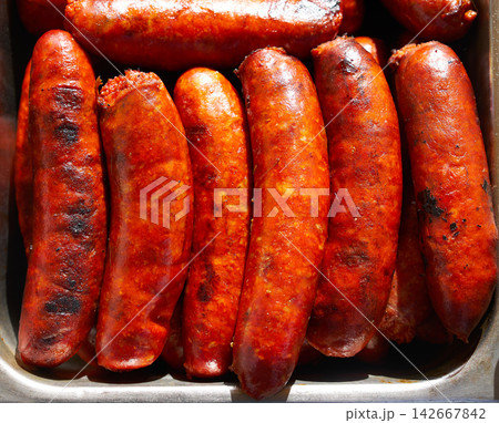 Chorizo sausage cooked at barbecue 142667842