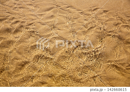 Clean beach water texture top view Clean beach water texture top view 142668615