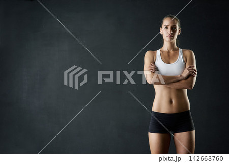 Fitness, body and portrait of woman with arms crossed in studio for health, training and wellness on black background. Mockup, gym or bodybuilder with weight loss, motivation or transformation tips Fitness, body and portrait of woman with arms crossed in studio for health, training and wellness on black background. Mockup, gym or bodybuilder with weight loss, motivation or transformation tips 142668760