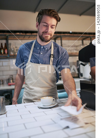 Man, receipt and coffee in cafe for payment with hospitality service, small business and professional machine for drink. Apron, paper slip and male barista or waiter in restaurant for sales and work Man, receipt and coffee in cafe for payment with hospitality service, small business and professional machine for drink. Apron, paper slip and male barista or waiter in restaurant for sales and work 142669058