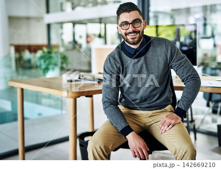 Desk, happy and portrait of business man in office with company pride, confidence and smile. Creative startup, professional agency and person for career, ambition and job for digital marketing Desk, happy and portrait of business man in office with company pride, confidence and smile. Creative startup, professional agency and person for career, ambition and job for digital marketing 142669210