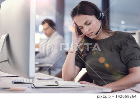 Woman, headache and burnout with call center, crm and anxiety for 404 mistake or glitch. Customer service agent, headset and contact us support with stress, problem and startup telecom employee Woman, headache and burnout with call center, crm and anxiety for 404 mistake or glitch. Customer service agent, headset and contact us support with stress, problem and startup telecom employee 142669264