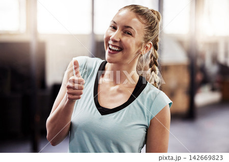 Woman, portrait and thumbs up for gym exercise or workout approval, good job or support. Female person, face and hand gesture for fitness routine or training results with weight loss, winner or proud Woman, portrait and thumbs up for gym exercise or workout approval, good job or support. Female person, face and hand gesture for fitness routine or training results with weight loss, winner or proud 142669823