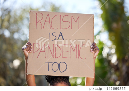 Social justice, activist and African woman with placard, outdoor and human rights for movement, strike and politics. Female person, demonstration and protest for equality on board or sign in public 142669835