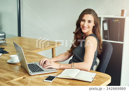 Portrait, woman and laptop in workplace with corporate job for notebook, check email and reading online news. Female consultant, notes and tech in modern office for smile, internet and client advice 142669860