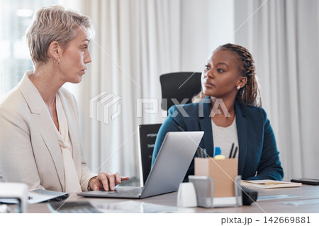 Businesswomen, laptop and meeting in office for review, employment or feedback as employees in hr management. Female people, technology and process for onboarding, promotion or staff in consultation 142669881