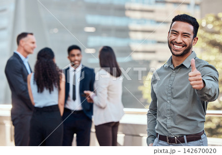 Thumbs up, portrait and happy businessman outdoor with confidence for business, job and work. Thank you, smile and asian man in city on balcony with team for success, motivation and support by like Thumbs up, portrait and happy businessman outdoor with confidence for business, job and work. Thank you, smile and asian man in city on balcony with team for success, motivation and support by like 142670020
