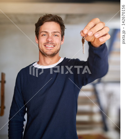 Happy man, portrait and new home with keys for apartment, investment or buying property. Handsome male person, realtor or homeowner with access to house, mortgage or buyer in real estate or building 142670156