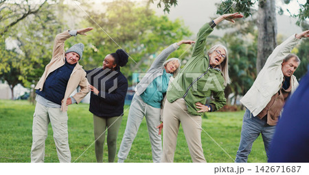 Yoga class, park and elderly group with coach exercise together in nature for health and wellness training. Peace, balance and senior people or friends outdoor workout or stretching for body fitness Yoga class, park and elderly group with coach exercise together in nature for health and wellness training. Peace, balance and senior people or friends outdoor workout or stretching for body fitness 142671687