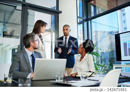 Business, people and meeting in office with laptop for teamwork, collaboration and plan as accountant. Employee, portrait and discussion for financial reviews, records and audit with company account 142671981