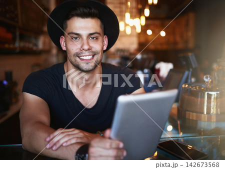 Online, coffee shop and portrait of man with tablet for small business, stock inventory and store website. Restaurant, hospitality and waiter by counter on digital tech for orders, help and inventory Online, coffee shop and portrait of man with tablet for small business, stock inventory and store website. Restaurant, hospitality and waiter by counter on digital tech for orders, help and inventory 142673568