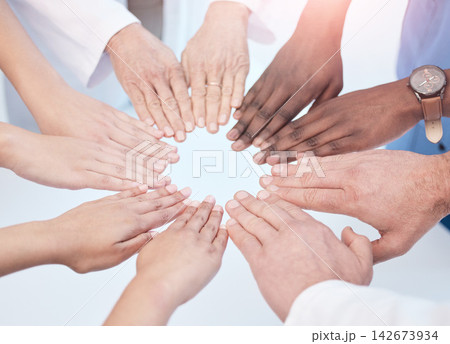 Doctors, people and hands in circle for teamwork in day for solidarity, support and diversity in hospital. Team building, healthcare or global collaboration for international company, trust or vision Doctors, people and hands in circle for teamwork in day for solidarity, support and diversity in hospital. Team building, healthcare or global collaboration for international company, trust or vision 142673934