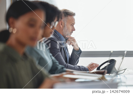 Office, telephone and mature man in call center for virtual technical support, chat or feedback. Employee, help and typing advice online for customer service, report and contact us for consultant Office, telephone and mature man in call center for virtual technical support, chat or feedback. Employee, help and typing advice online for customer service, report and contact us for consultant 142674009