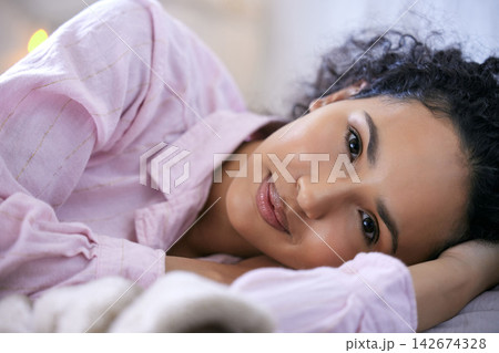 Woman, happy or morning portrait in bedroom with pyjamas for wake up rest and relax sleep. Excited, female person and head on pillow with smile for peace, comfort and lazy weekend feeling fresh Woman, happy or morning portrait in bedroom with pyjamas for wake up rest and relax sleep. Excited, female person and head on pillow with smile for peace, comfort and lazy weekend feeling fresh 142674328