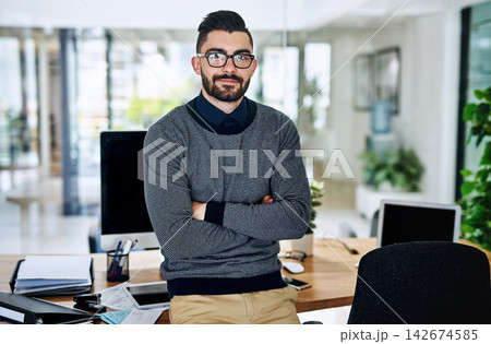 Office, crossed arms and portrait of business man at desk with company pride, confidence and opportunity. Creative startup, professional agency and person for career, work and job in modern workplace Office, crossed arms and portrait of business man at desk with company pride, confidence and opportunity. Creative startup, professional agency and person for career, work and job in modern workplace 142674585