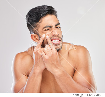Pimple, hands and portrait of man in studio for skincare, skin dermatology or facial outbreak with white background. Body, upset and male model with acne for grooming, beauty wellness or blackhead Pimple, hands and portrait of man in studio for skincare, skin dermatology or facial outbreak with white background. Body, upset and male model with acne for grooming, beauty wellness or blackhead 142675068