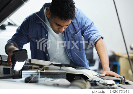 Workshop, mechanic or man with car engine for inspection, maintenance and professional repair. Motor expert, vehicle and check with torch for water pump, radiator and battery for problem solving Workshop, mechanic or man with car engine for inspection, maintenance and professional repair. Motor expert, vehicle and check with torch for water pump, radiator and battery for problem solving 142675142